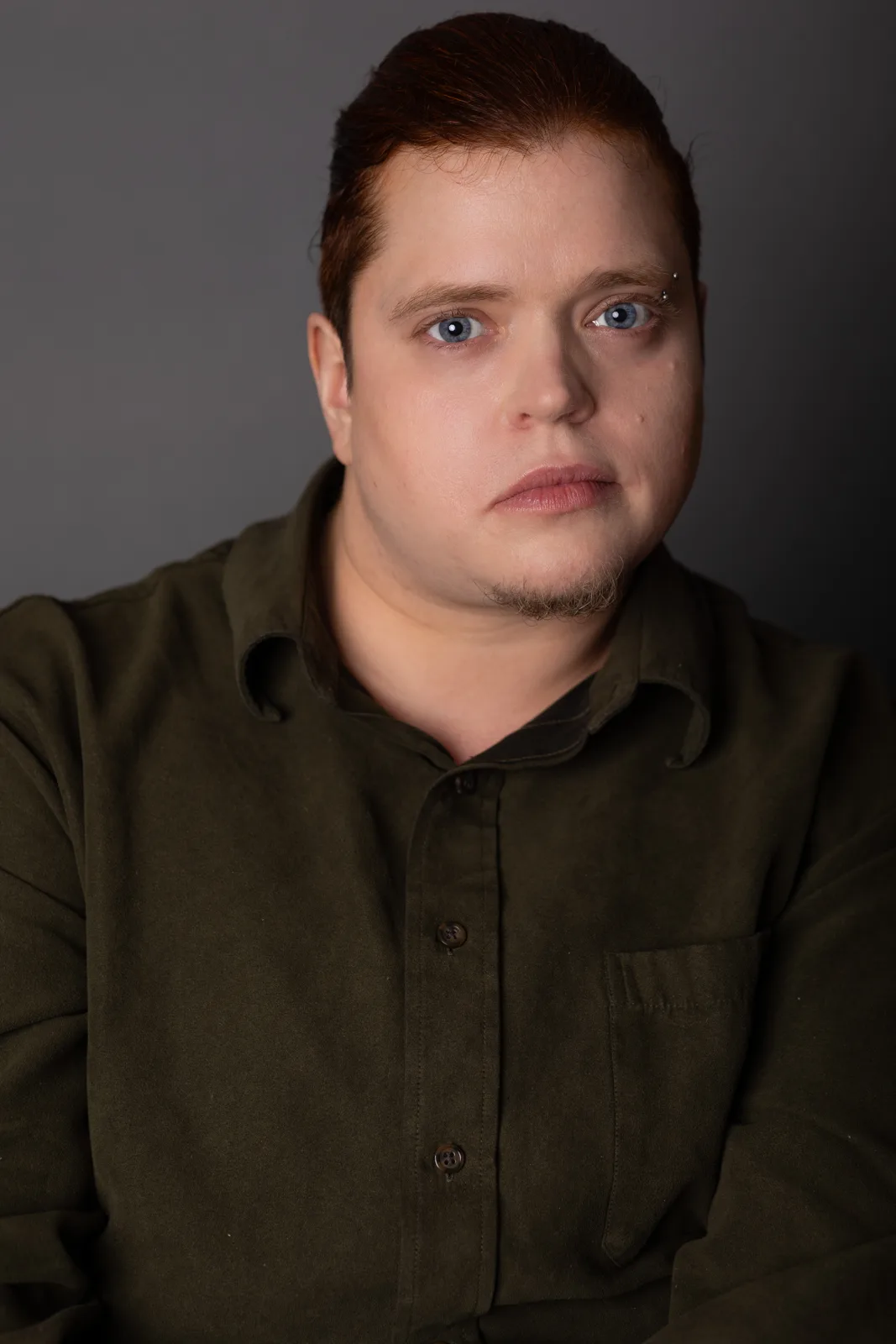 Tess Raunig, actor Vancouver BC, in a dramatic studio portrait