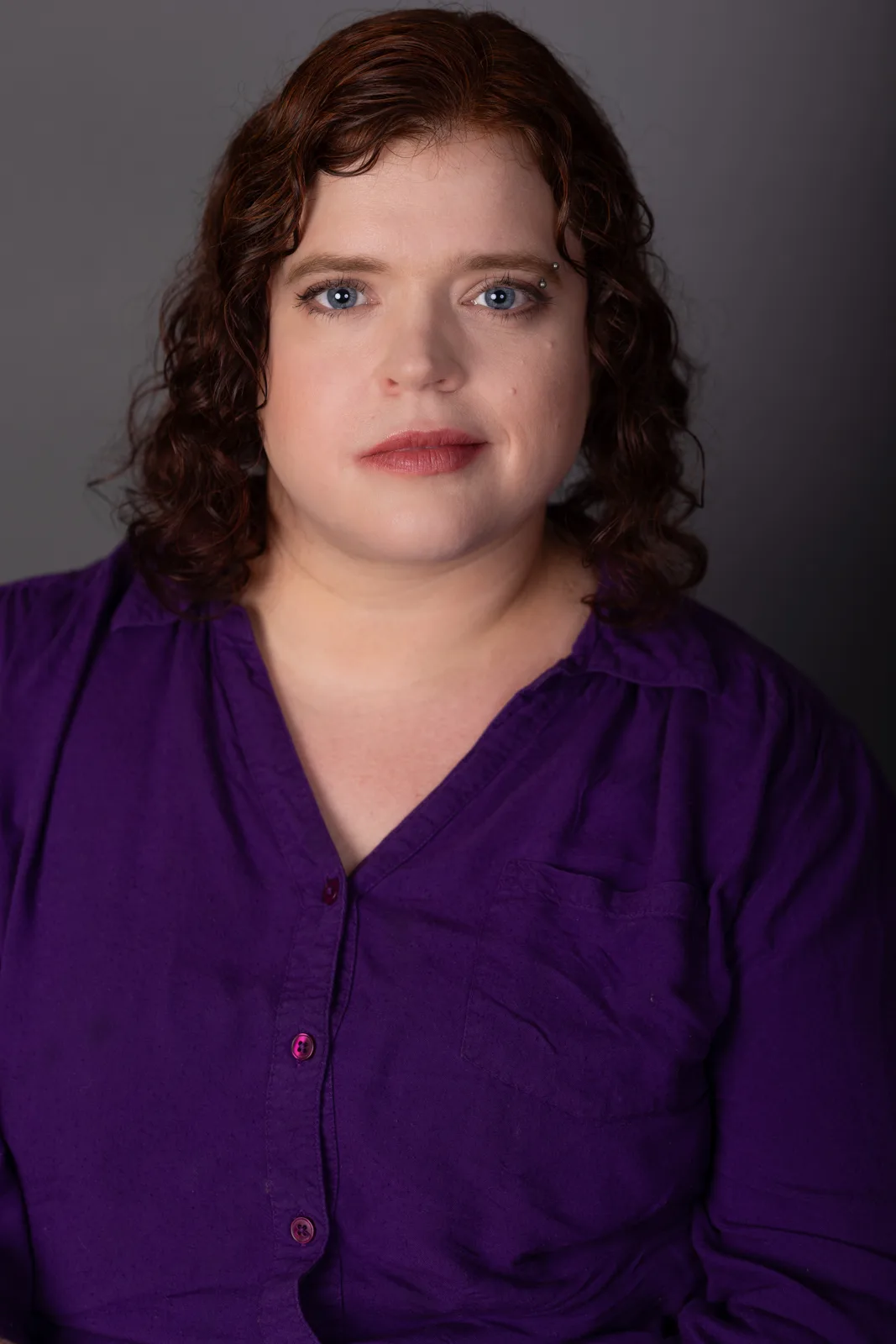 Tess Raunig, singer Vancouver BC, portrait in purple
